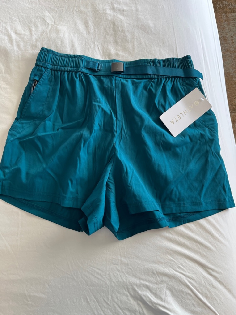 NWT Teal women’s Athletha Shorts, with side pockets and adjustable waist, Small